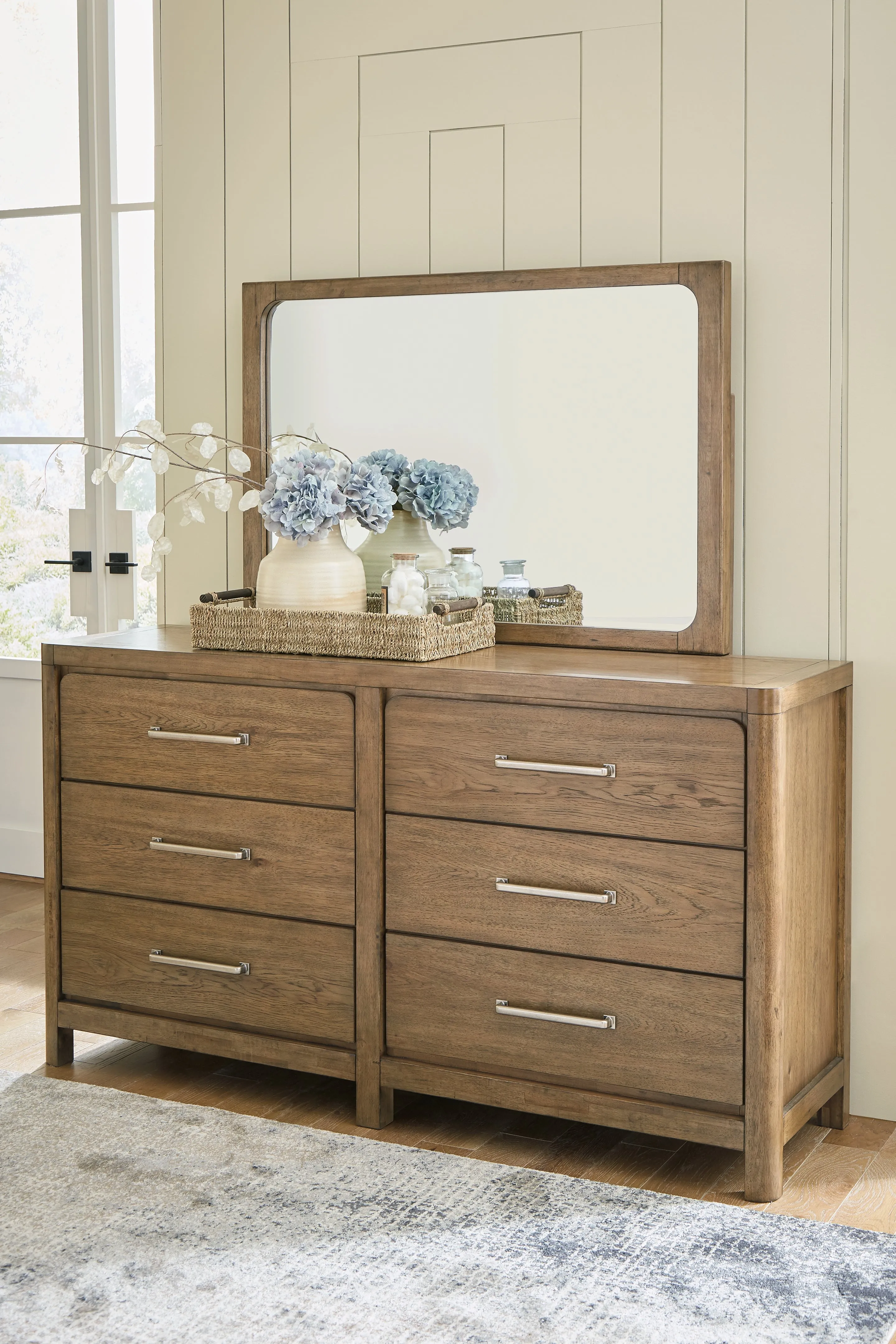 Cabalynn King Panel Bed with Storage with Mirrored Dresser, Chest and Nightstand in Light Brown